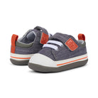 Pair of children's shoes with gray, orange, and white design on a white background
