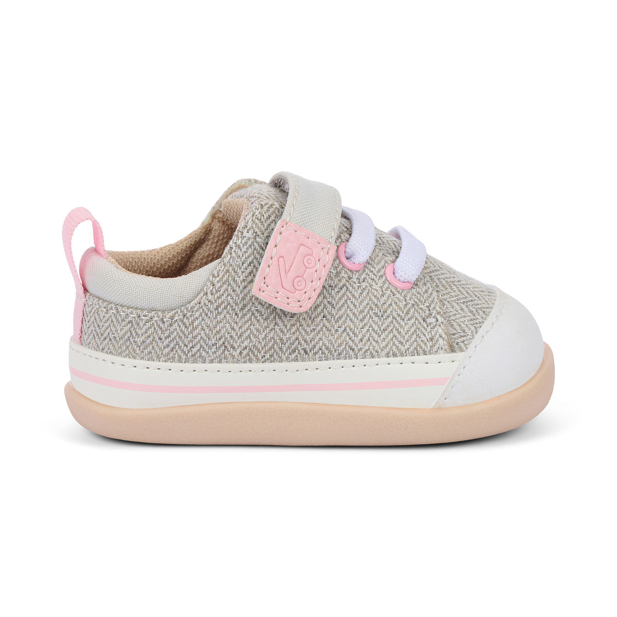 Children's shoe with gray pattern, pink accents, and white sole on a white background