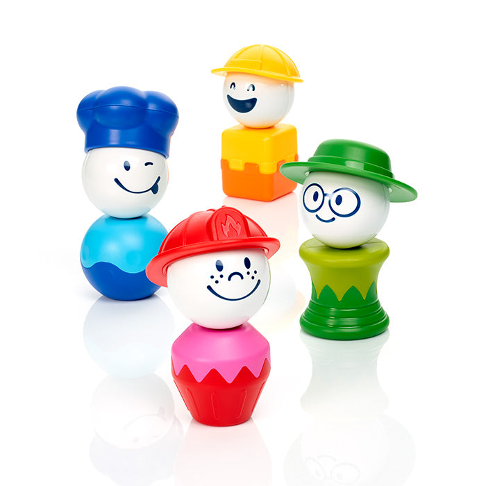 SmartMax My First People magnetic toy set showing four figures in mixed-up combinations—a construction worker head with a blue body, a gardener head with a red body, a firefighter head with a green body, and a chef head with an orange body—standing against a white background.