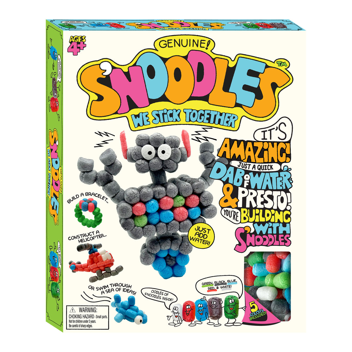 Box of Snoodles Genuine Snoodles toy kit on a plain white background. The packaging features a colorful design with the brand name 'Snoodles' in large letters, showing a constructed gray stick figure made of gray pom-poms and colorful round beads, along with smaller examples of built items and a photo of the included colorful beads.