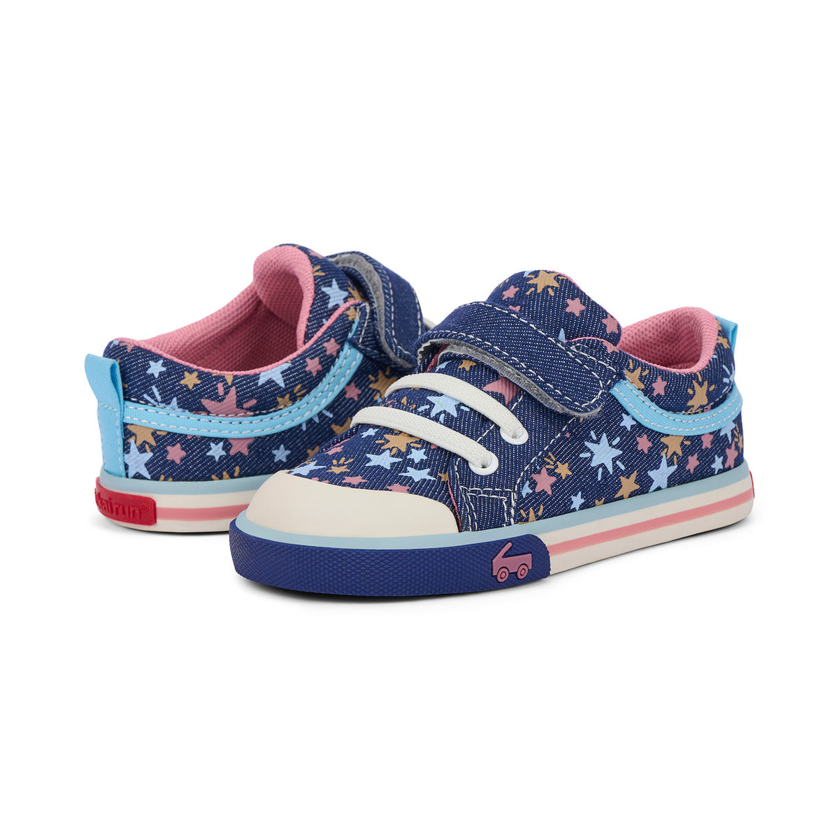 Pair of children's blue sneakers with star pattern on a white background