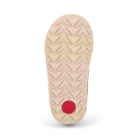 Beige shoe sole with red logo on a white background
