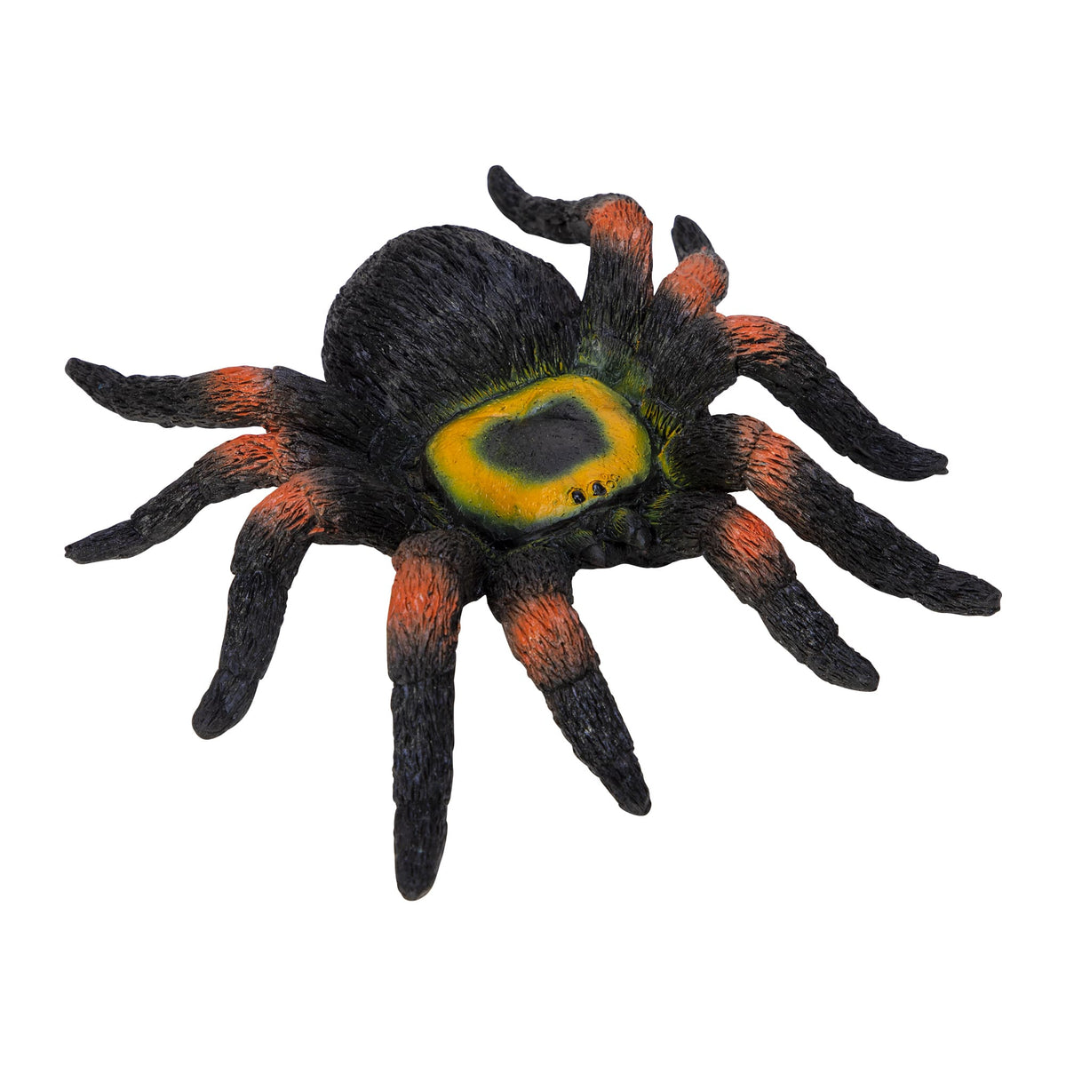 Realistic spider toy with black, orange, and green colors on a white background