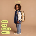 Child wearing a blue jacket and jeans with a gold backpack on a beige background, with text indicating name, age, grade, and height.