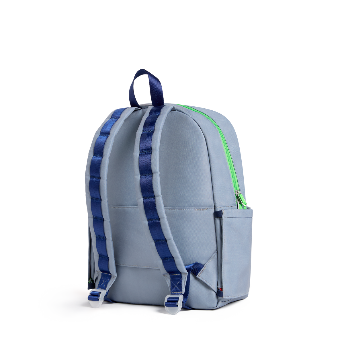 A light blue-gray backpack shown from the back, featuring dark blue padded shoulder straps, a bright green zipper, and white plastic buckle details, set against a plain white background.
