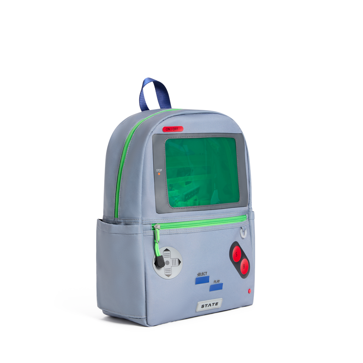 A light blue backpack designed to look like a retro gaming console, featuring a green screen window, green zipper accents, red buttons, and a blue top handle, shown on a plain white background.