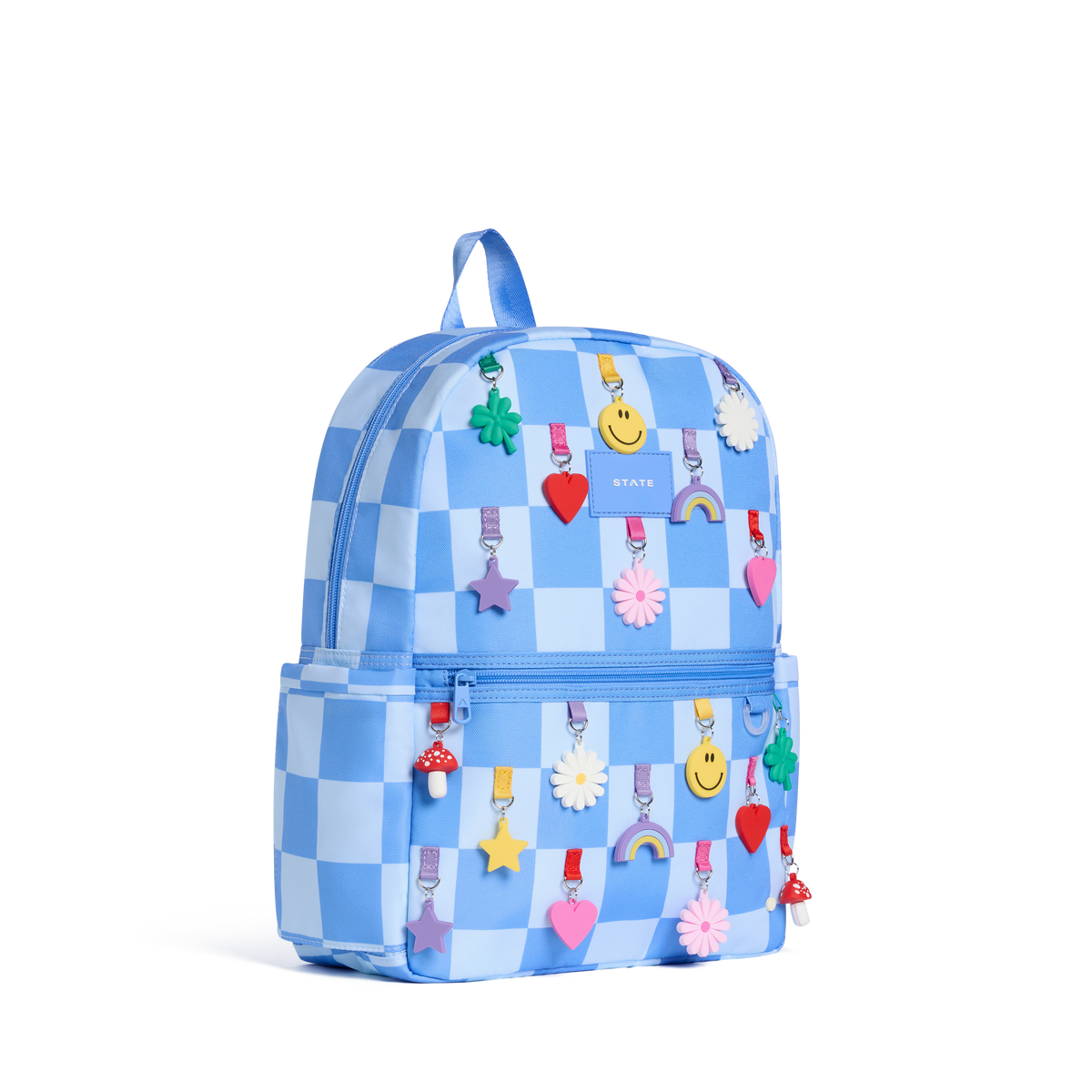 A light blue and white checkered backpack decorated with colorful cartoon character charms, shown on a plain white background.
