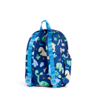 A small blue backpack with a dinosaur and abstract pattern, shown from the back on a white background.