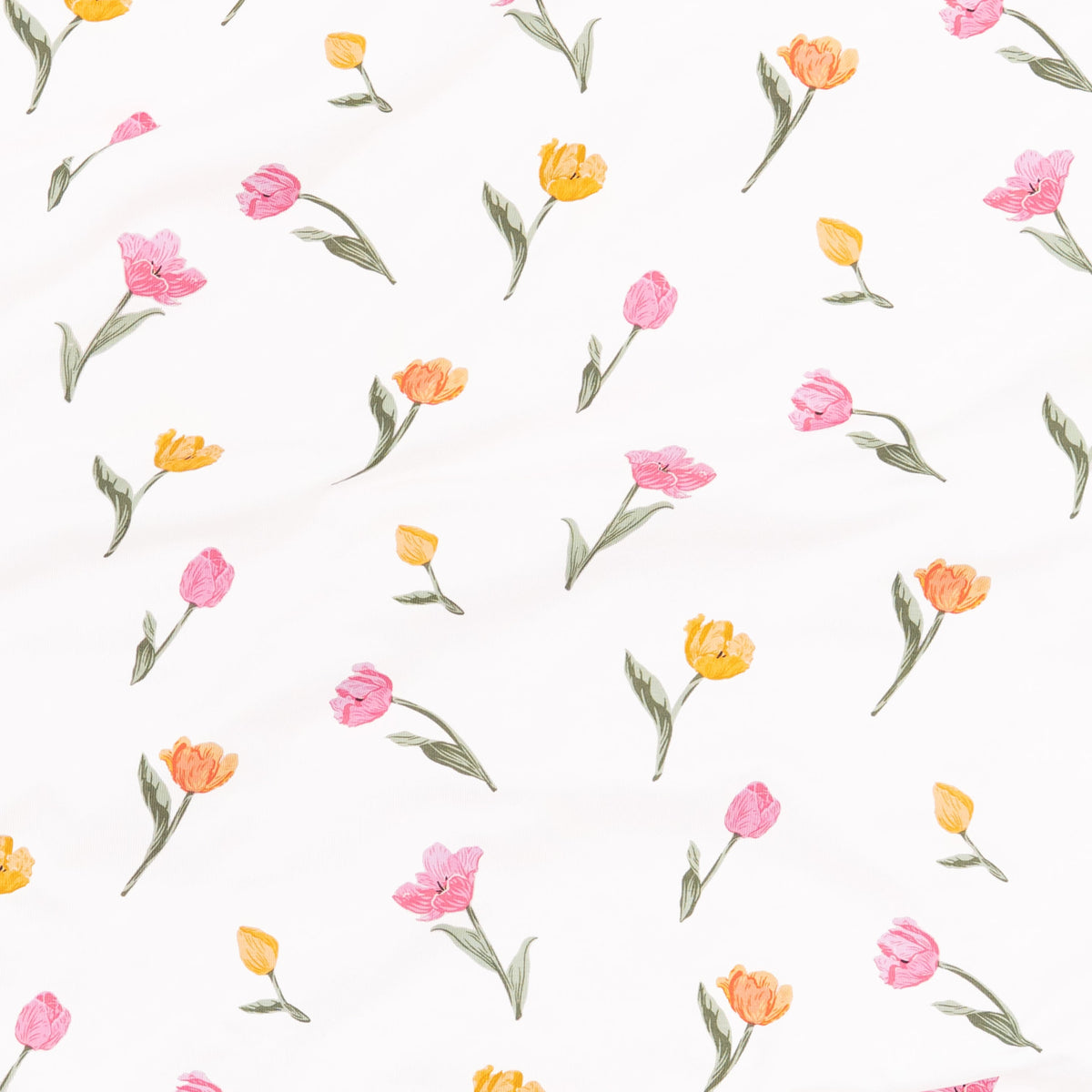 Pattern of pink and yellow tulips on a white background