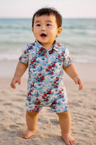 Child wearing a colorful swimsuit on a beach
