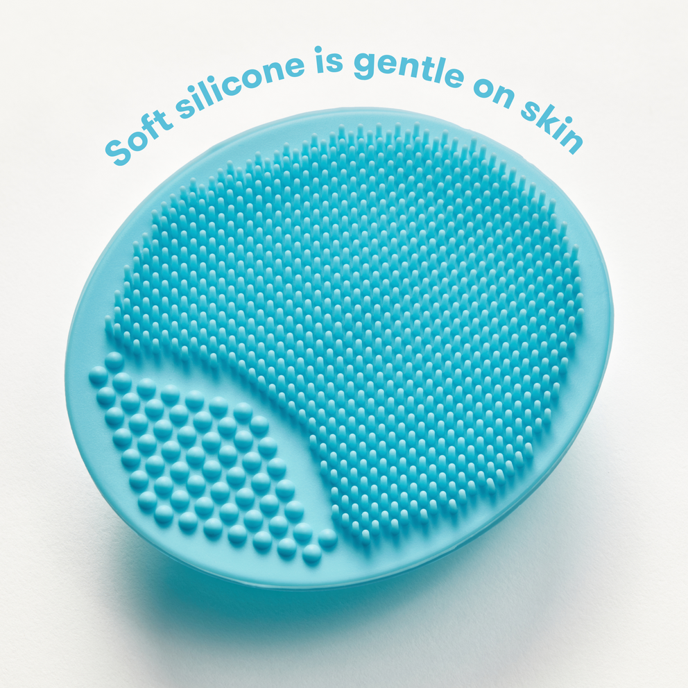 Blue silicone scrubber with textured surface on a white background