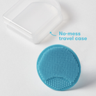 Blue silicone scrubber with 'No-mess travel case' text on a white background