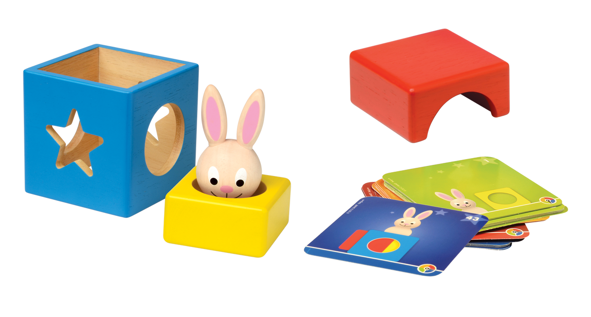Children's educational toy set with colorful boxes and cards featuring a rabbit design.