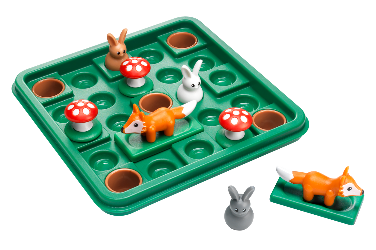 Toy puzzle with animal figures and mushrooms on a green tray
