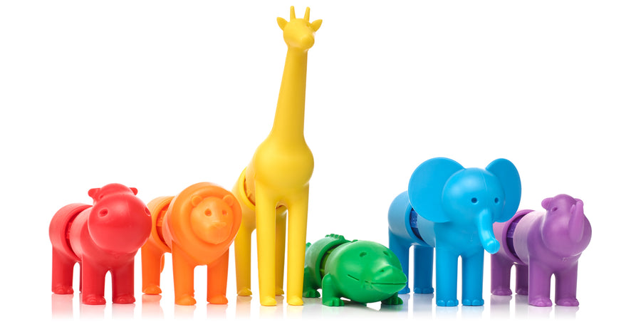 Colorful animal figurines including a giraffe, elephant, hippo, and others on a white background