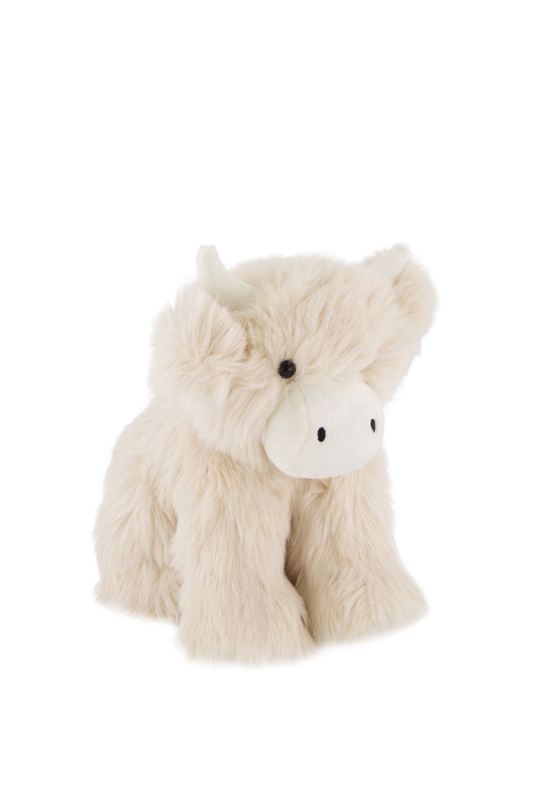 Plush toy cow on a white background