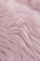Close-up of the ultra-soft, textured violet faux fur of Jamie Kay's Moon the Kitty plush toy.