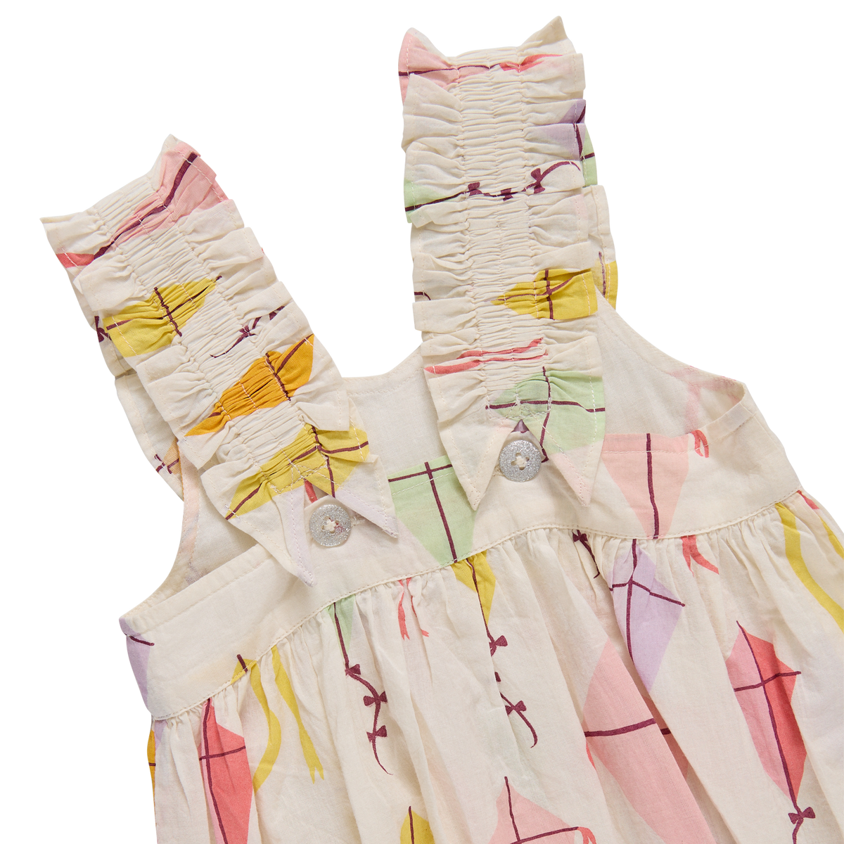 Children's dress with colorful geometric pattern on a white background