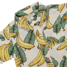 Shirt with banana and leaf pattern on a white background