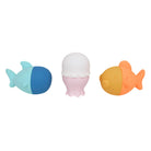 Three colorful bath toys shaped like a shark, octopus, and fish on a white background