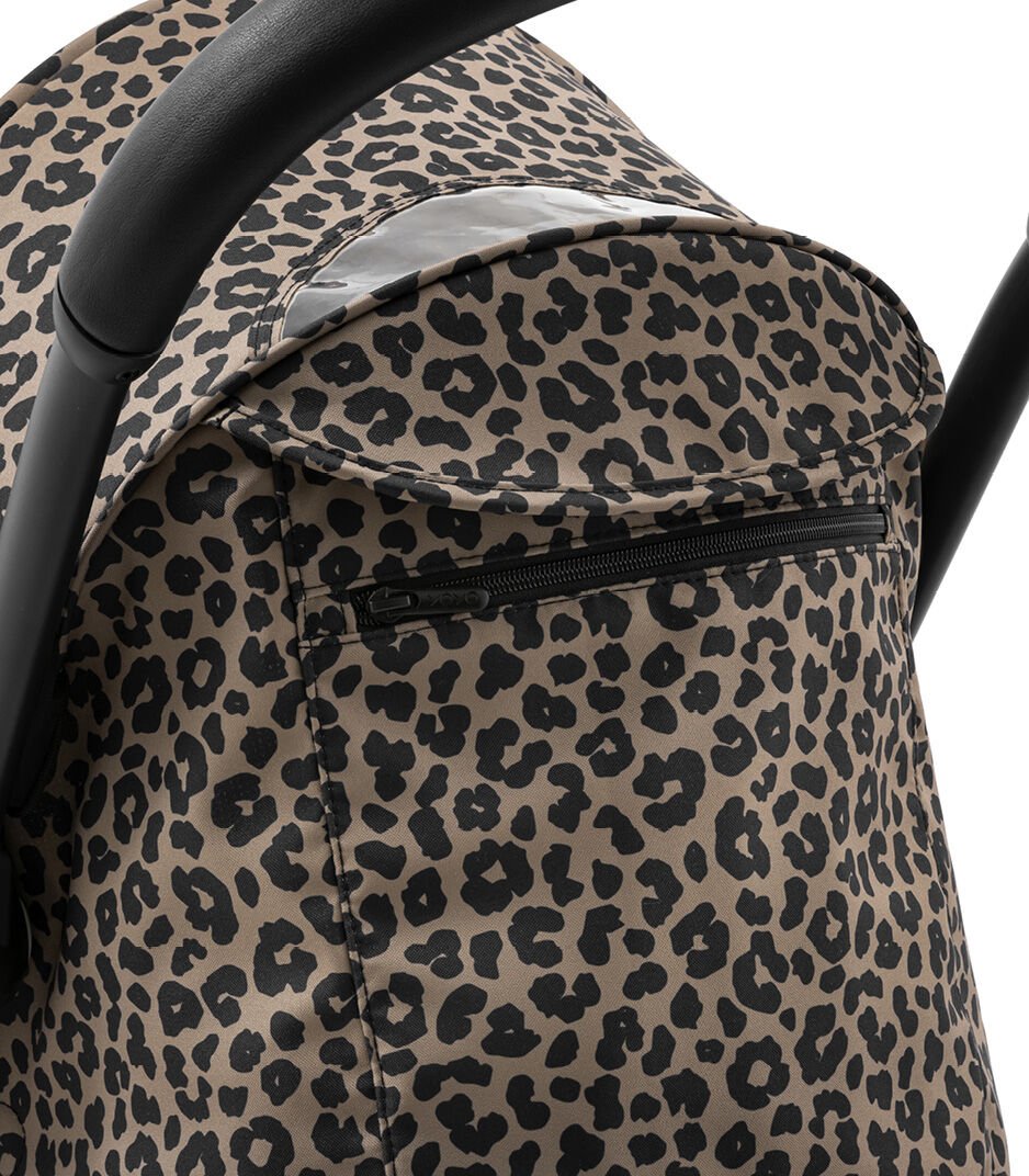 Leopard print baby carrier with black zipper on a white background
