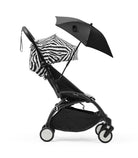 Black stroller with a zebra-patterned sunshade and black umbrella on a white background