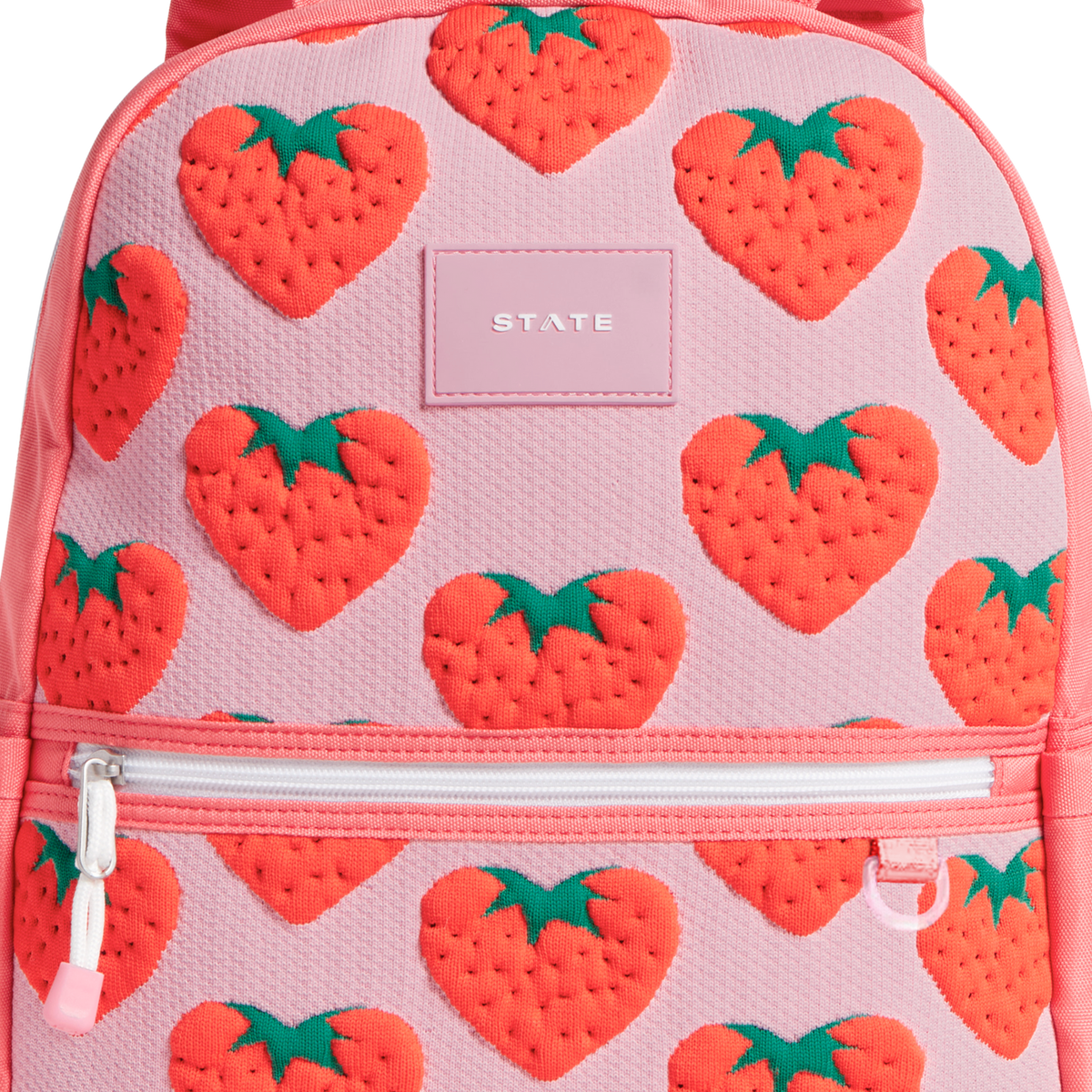 Pink backpack with strawberry pattern and 'STATE' brand logo.