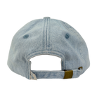 Light blue denim cap with a brown leather strap on a white background