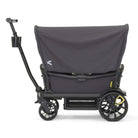 Black stroller with a cover on a white background