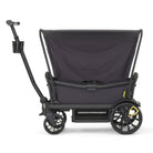 Black stroller with canopy on a white background
