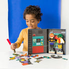 Child playing with a toy set featuring colorful figures and a puzzle on a white surface.