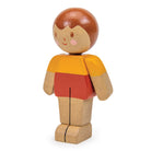 Wooden toy figure with a red shirt and yellow sleeves on a white background