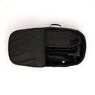 Black travel bag with a folded chair inside on a white background