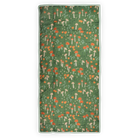 Green towel with mushroom and flower pattern on a white background