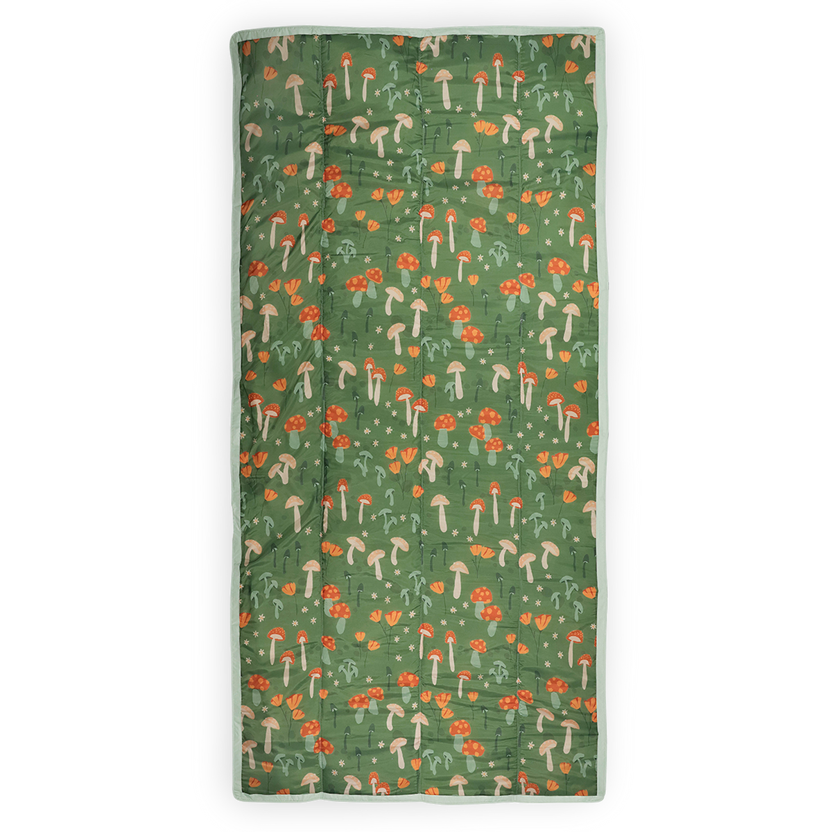 Green towel with mushroom and flower pattern on a white background