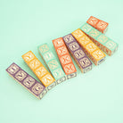 Colorful letter blocks on a light green background