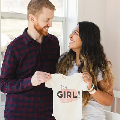 It's A Girl Pregnancy Announcement Organic Baby Onesie by Urban Baby Co.