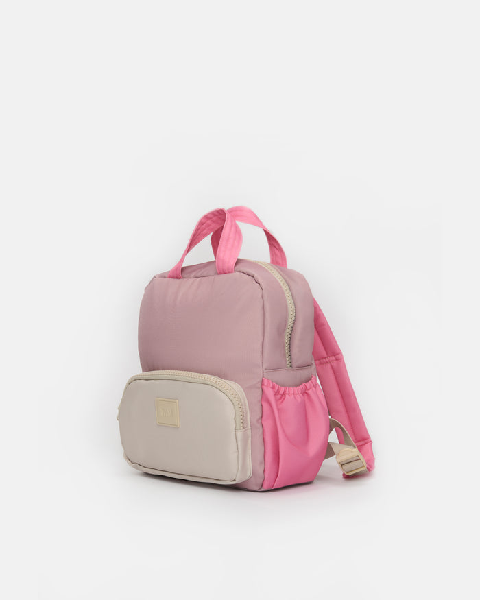 Pink and beige backpack on a white background