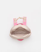 An overhead view of a small pink backpack with an open beige zippered pouch inside, set against a plain white background.