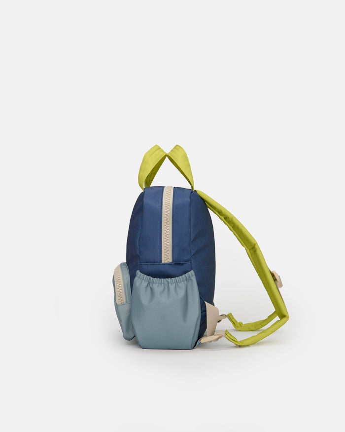 Small blue and green backpack on a white background