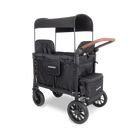 Black double stroller with canopy on a white background