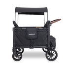 Black WonderFold stroller wagon on a white background