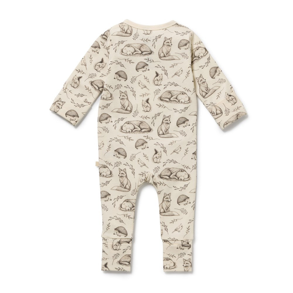 Baby onesie with animal pattern on a white background
