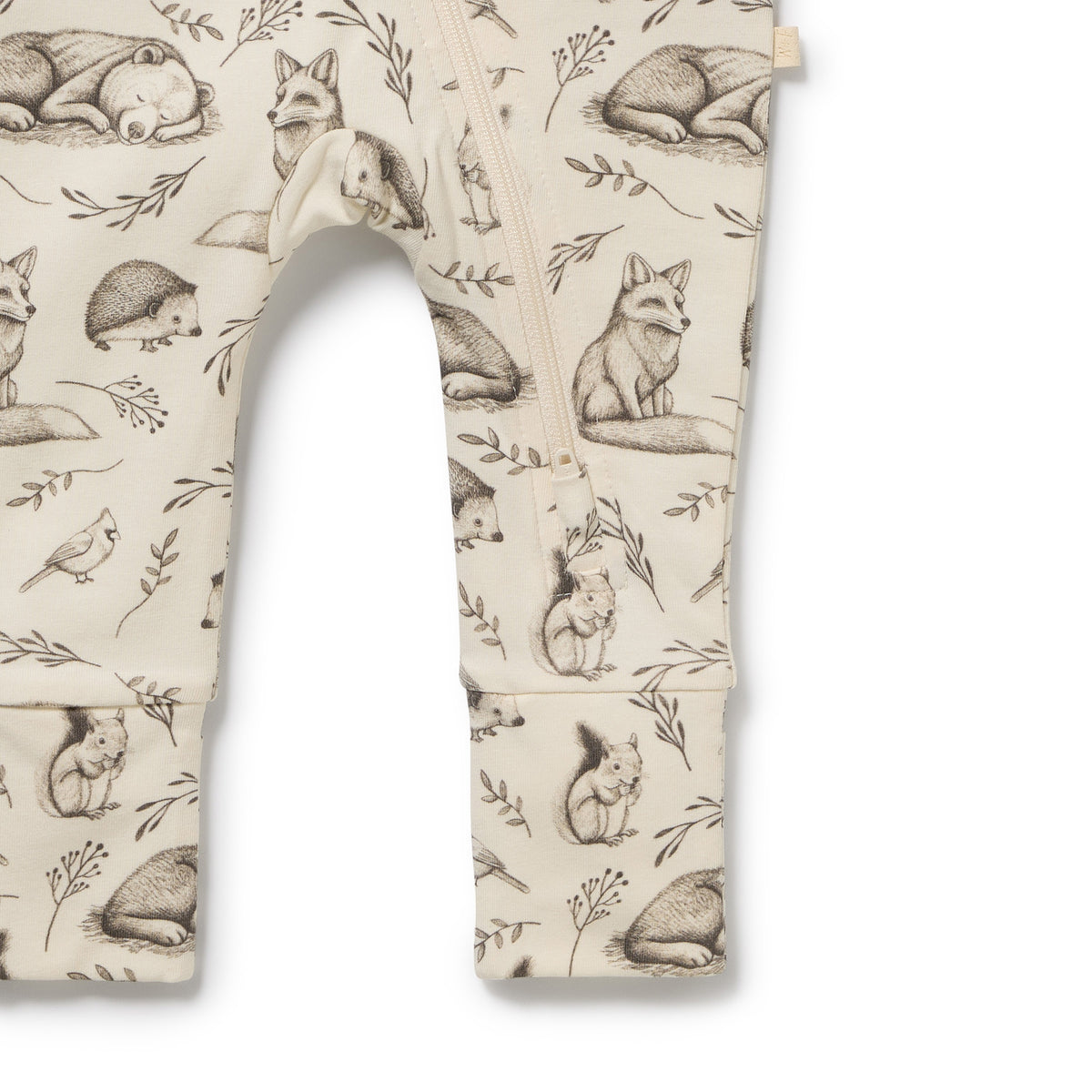 Patterned pants with forest animal design on a white background