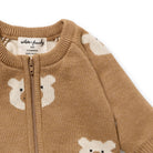 Brown baby sweater with bear designs and a visible brand label on a white background