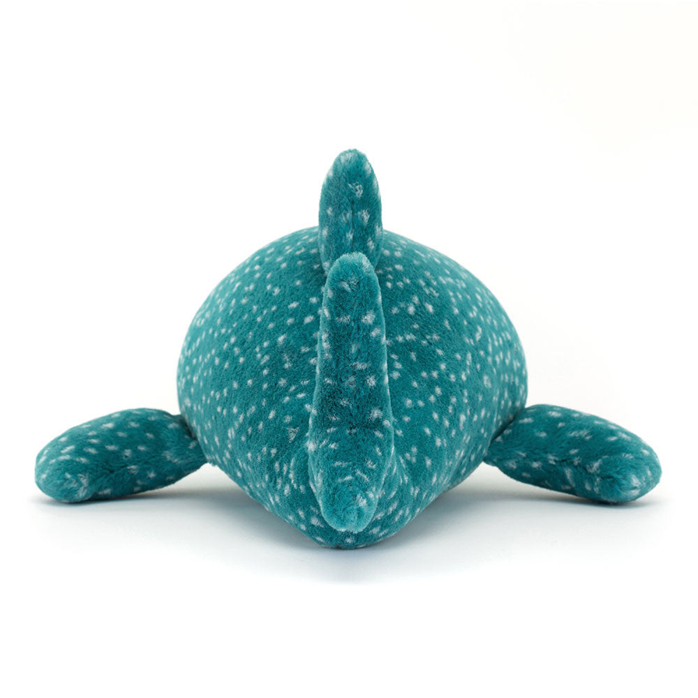 Teal plush toy with speckled pattern on a white background