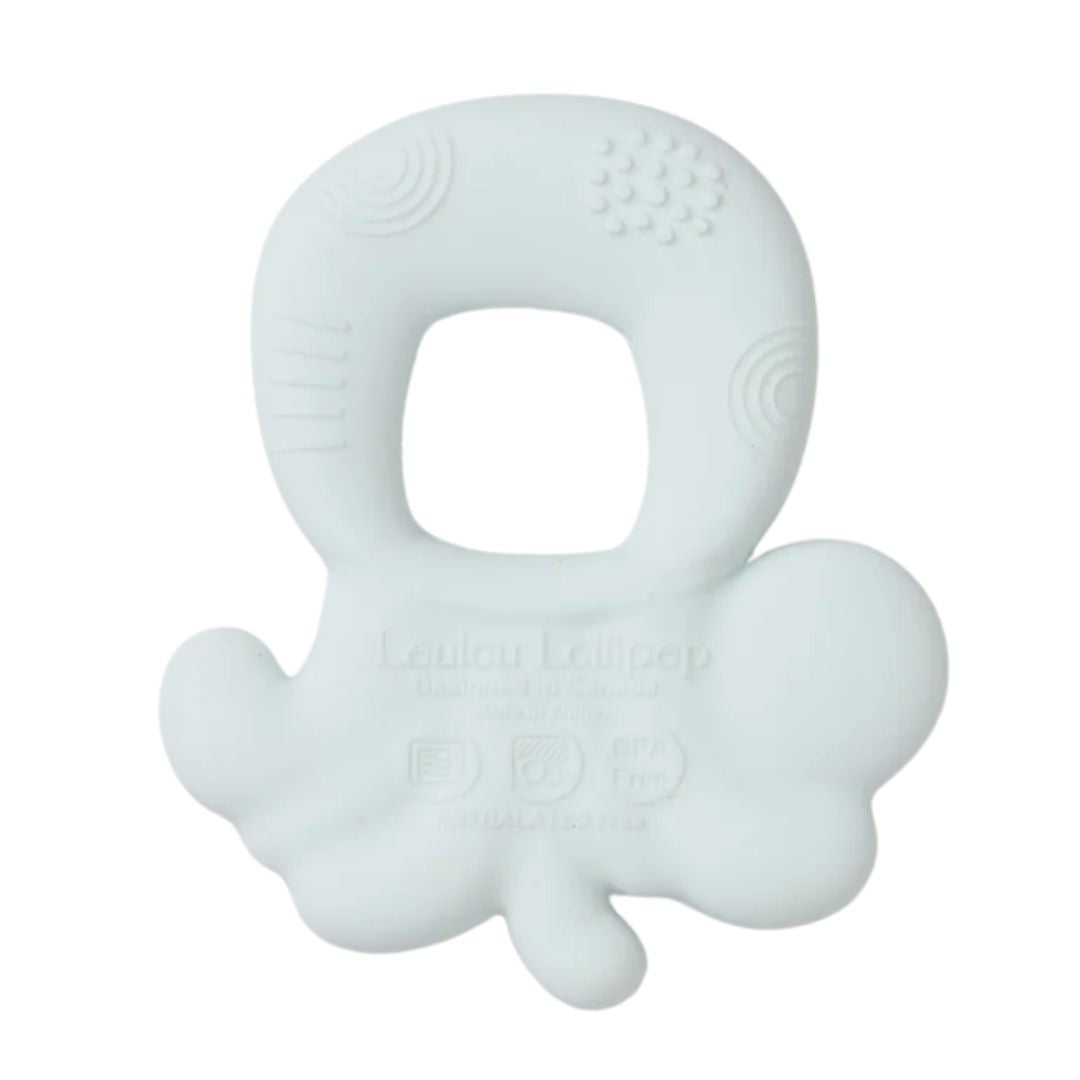 Light blue teething ring on a light gray background