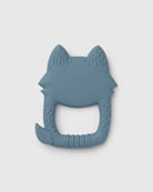 A blue-gray silicone baby teether shaped like a fox head, featuring textured ridges and a handle, shown on a light gray background.