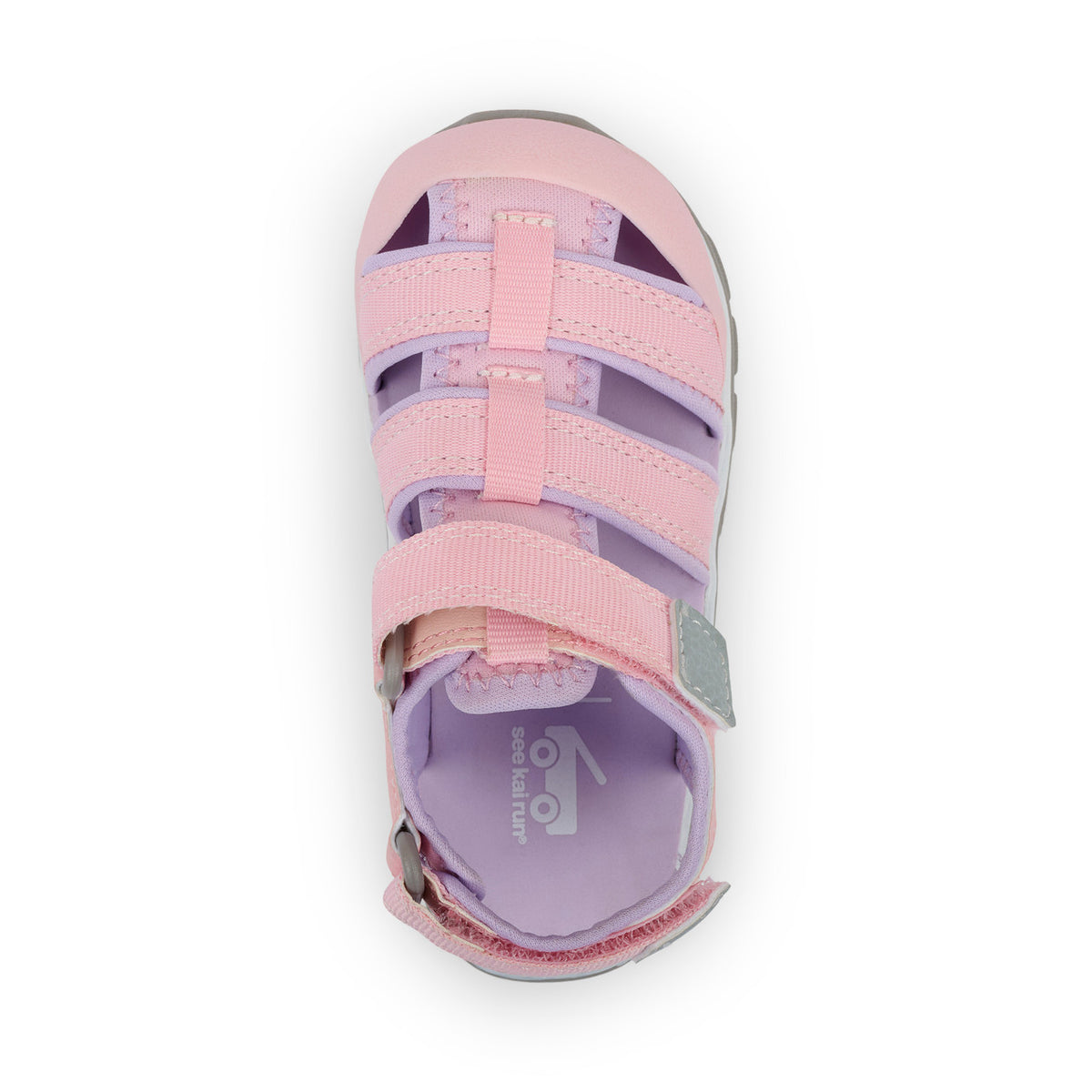 Pink and purple sandal with multiple straps on a white background