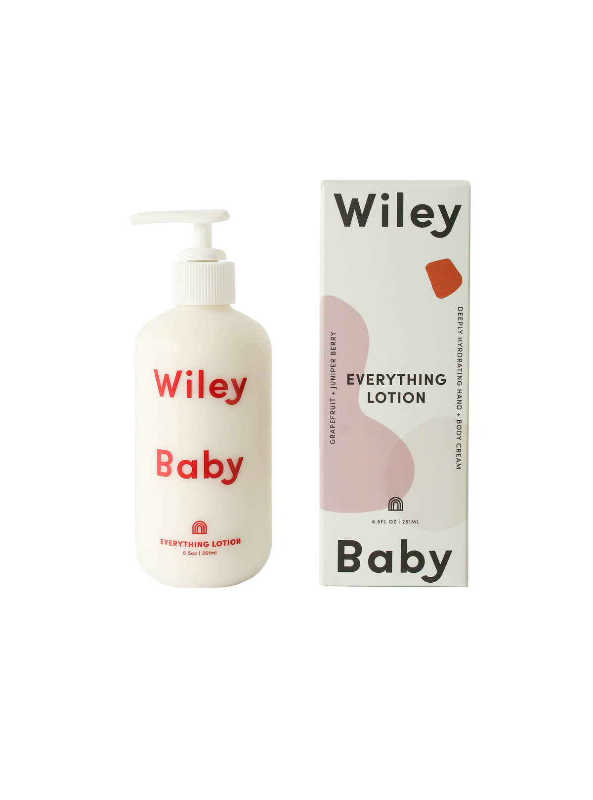 A bottle of Wiley Baby Everything Lotion next to its product box, both featuring a clean white design with red and pink graphic accents on a solid white background.